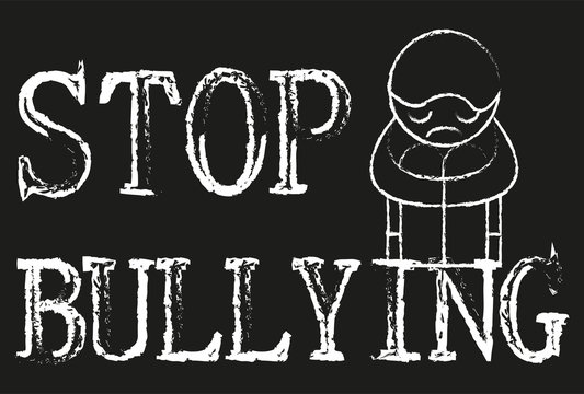 Pizarra negra con stop bullying.