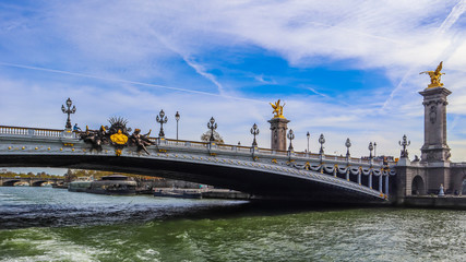 Fototapeta na wymiar Historic bridge (Pont Alexandre III) over the River Seine in Paris France
