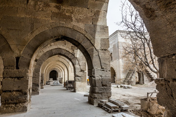Arches and columns in Sultanhani caravansary on Silk Road.