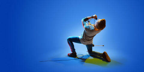 Rock star celebrity blue background isolated