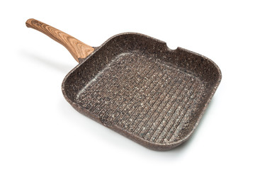 Photo of a ceramic Grill frying pan with a wooden handle isolated on a white background. Studio shot