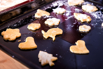 close-up of Christmas baking New Year's gingerbread on the baking sheet