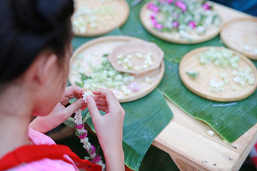 Close-up garland handmade of flowers used for special occasion day in Thailand.