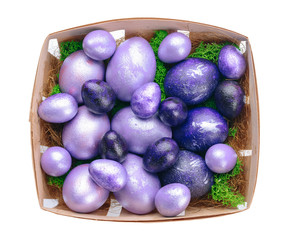 Box with beautiful Easter eggs on white background