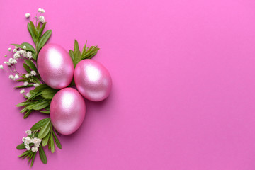 Beautiful Easter eggs on color background