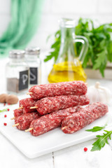 Raw lula kebab on skewers