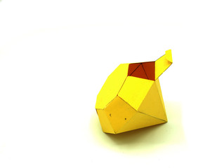 Geometric shape cut out of paper and photographed on white background. Geometry net of Diamond. 2D shape that can be folded to form a 3D shape or a solid. Unfolded three Dimensional Figures. Isolated.