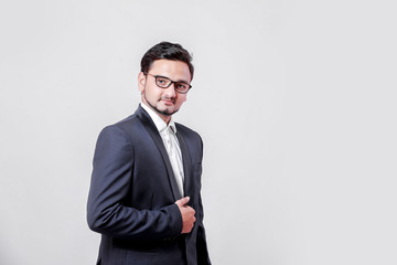 Young Indian / Asian businessman in suit
