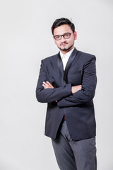 Young Indian / Asian businessman in suit