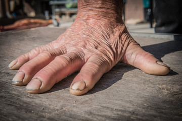 Hand of an old agricultural worker