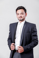 Young Indian / Asian businessman in suit