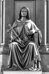 Fototapeta premium old statue of saint, isolate