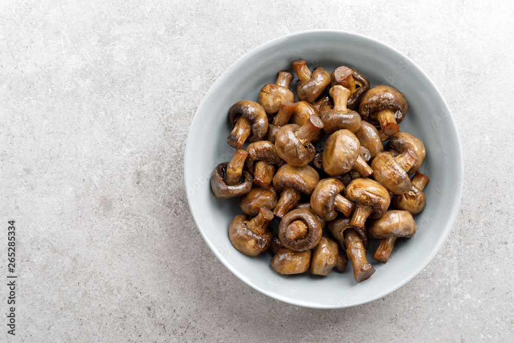 Poster fried mushrooms, champignons, top view