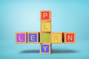 3d rendering of colorful alphabet toy blocks making LEARN and PLAY signs on blue background