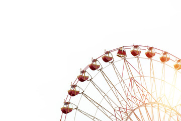 Half of Ferris wheel with background of blue sky.