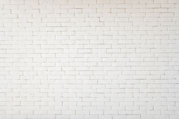 Old grunge white stone brick wall texture abstract background.