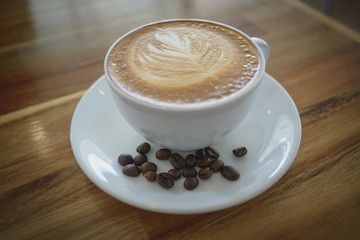 A cup of coffee in somewhere cafe.