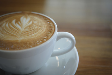 A cup of coffee in somewhere cafe.