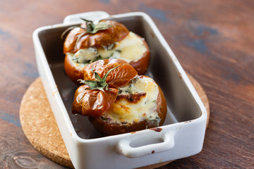 Stuffed tomatoes with cream cheese, cottage cheese and basil