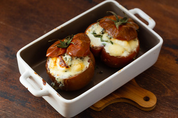 Stuffed tomatoes with cream cheese, cottage cheese and basil