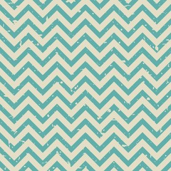 Seamless scratched pattern with and blue zigzag lines on beige background.
