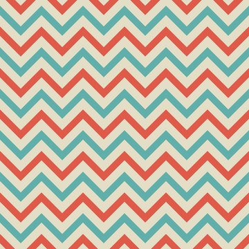 Seamless abstract pattern with red and blue zigzag lines on beige background.