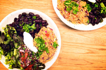 Vegan Buddha Bowl with Beans, Quinoa, Salsa, Salad and Coriander