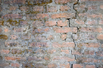 Old brick wall with crack