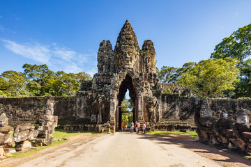Fototapeta premium Angkor Wat, Cambodia September 6th 2018 : Tourists at the south gate of the Angkor Thom temple complex, Siem Reap, Cambodia
