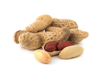 Dried peanuts on the white background.