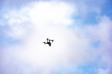 Naklejka na ściany i meble Drone fly in the sky
