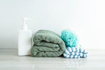 Obraz na płótnie Canvas Bathroom towel and bath ball shower gel personal care background material