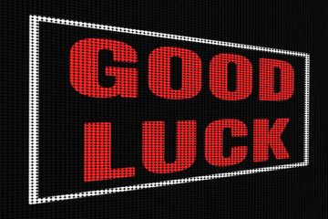 Good Luck red text on dark screen