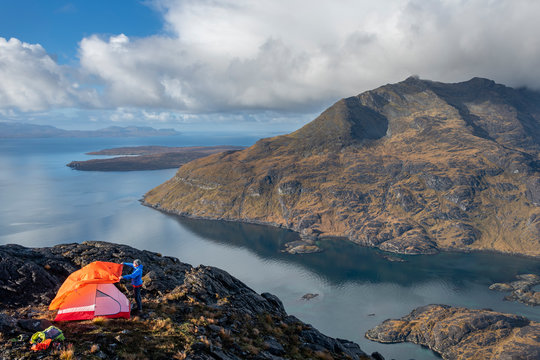 Wild camping on the top of Sgurr Na Stri looking towards Loch Coruisk and the main Cuillin ridge, Isle of Skye, Inner Hebrides, Scotland