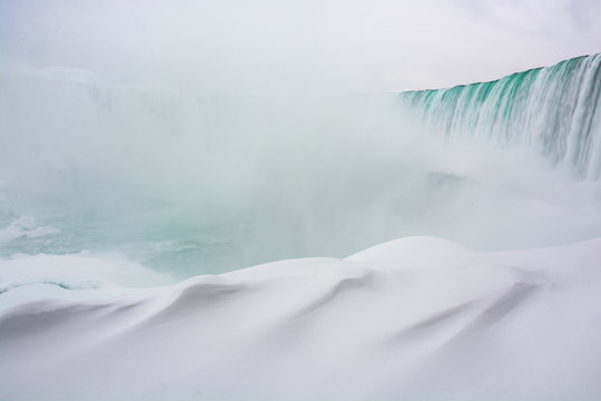 Frozen Niagara Falls in January, view from beneath the falls, Ontario, Canada