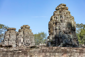 Fototapeta premium Beautiful face sculptures at the famous Bayon temple in the Angkor Thom temple complex, Siem Reap, Cambodia