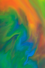 Fototapeta na wymiar Fluid acrylic paint background, abstract texture. Colorful mix of acrylic vibrant colors.