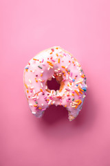 Spinkle Donuts on Colorful Background