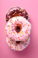 Spinkle Donuts on Colorful Background