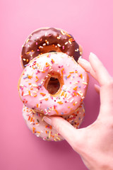 Spinkle Donuts on Colorful Background
