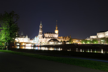 Streets and lights, reflection and shine of the night city of Dresden, Germany.