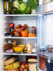 open refrigerator filled with food