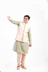 young Indian man talking on mobile phone