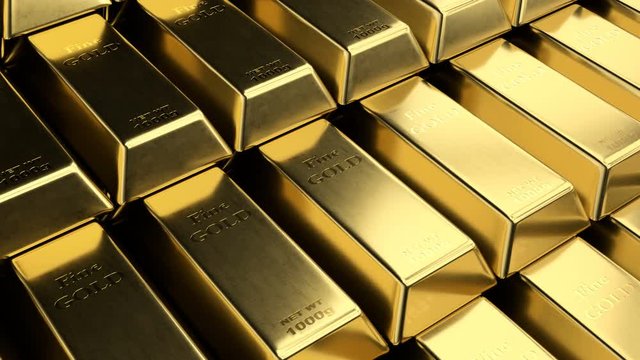 Close-up view of fine gold bar stacks. Loopable video showing rows and stacks of fine gold ingots. Camera showing each scratch on every golden bullion surface.