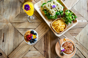 brunch with mimosa cocktail on Wood table