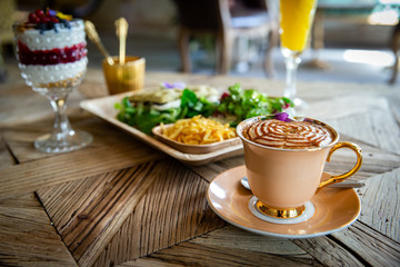 brunch with mimosa cocktail on Wood table