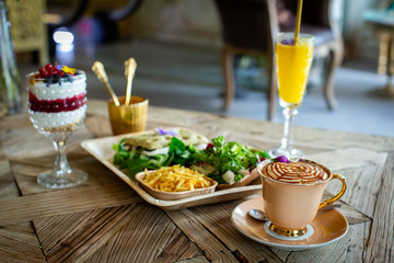 brunch with mimosa cocktail on Wood table
