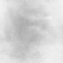 Silver with gray ink and watercolor texture on white paper background. Paint leaks and ombre effects. Hand painted abstract image.