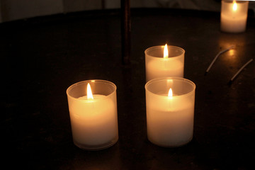 group of candles on dark background