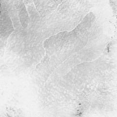 Silver with gray ink and watercolor texture on white paper background. Paint leaks and ombre effects. Hand painted abstract image.